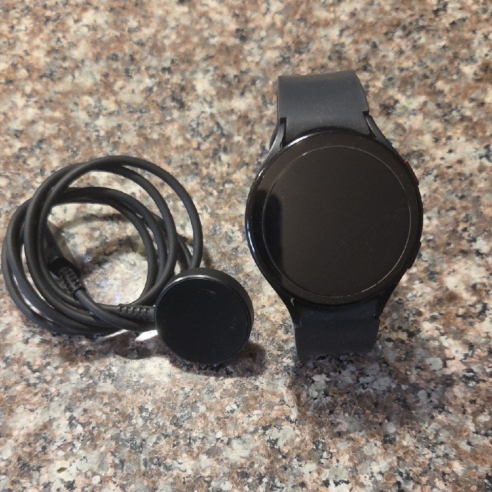 Samsung Smartwatch with Black Band and Charger
